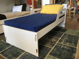 Urban Montessori Height Adjustable Bed.