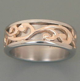 R251a Stg.Silver and rose gold Carved Koru Band