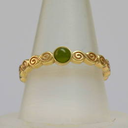  R360G Celtic Spiral band in yellow gold set with Pounamo New Zealand greenstone.