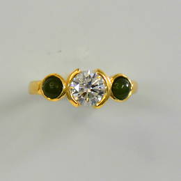 R384 Single Diamond  with pounamu side stones in yellow Gold.