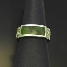 R351KRU Ring with carved koru design, Pounamu, NZ Greenstone and Stg.Silver.