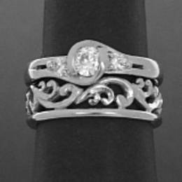 R279F Fitted carved Fine koru wedding band in White Gold