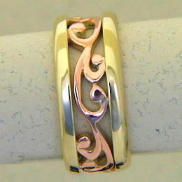 R251 Rose and yellow gold carved koru band