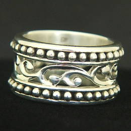 R263 Silver carved band, koru with beaded outer bands