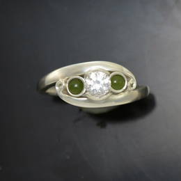 R362GDG  Diamond and pounamu crossover style koru engagement ring