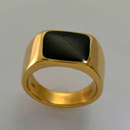  R341. Pounamu, NZ Greenstone  set  in a heavy gold signet type ring.