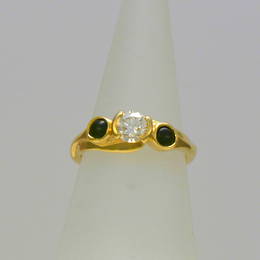 Style R267GDG  Pounamu NZ Greenstone and diamond  in a koru style setting in yellow gold.