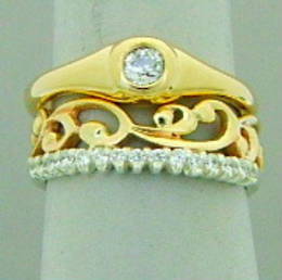 Fitted gold carved koru wedding band diamond set