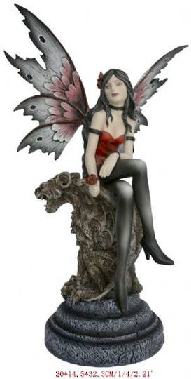 Red Fairy Sitting on Gargoyle