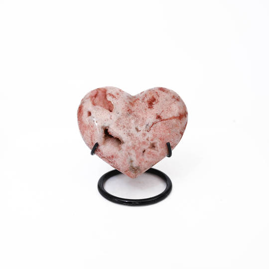 Pink Amethyst Heart on a black metal stand.
