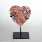 Pink Amethyst Heart on a black metal stand.