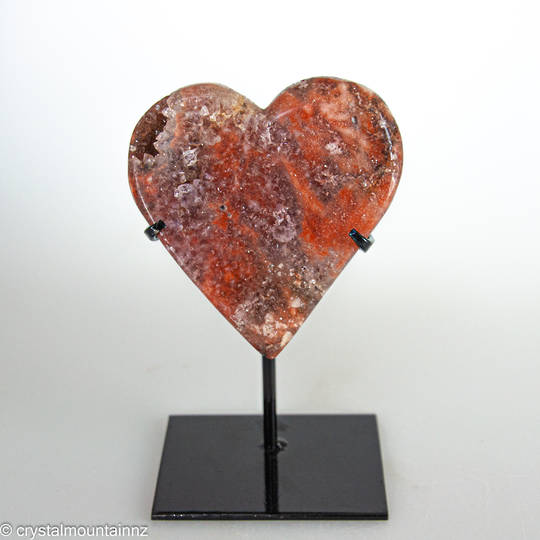 Pink Amethyst Heart on a black metal stand. image 0