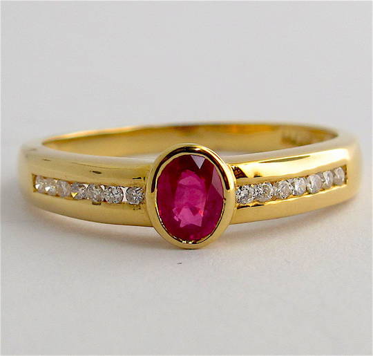 18ct yellow gold natural ruby and diamond set ring