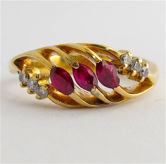 18ct yellow gold natural ruby and diamond dress ring