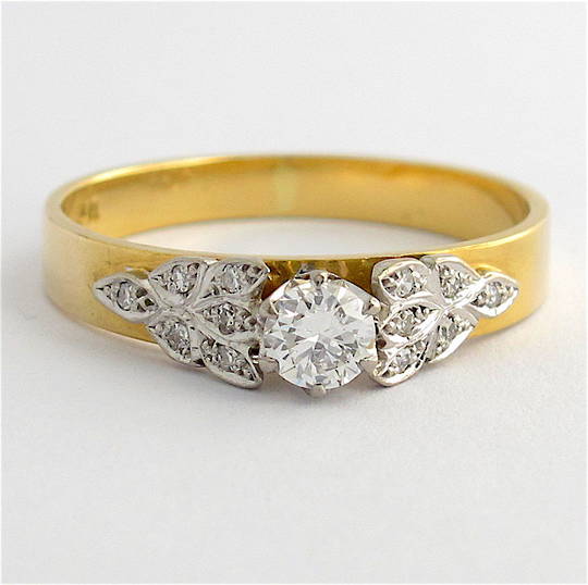 Vintage 18ct yellow and white gold diamond solitaire with fancy design