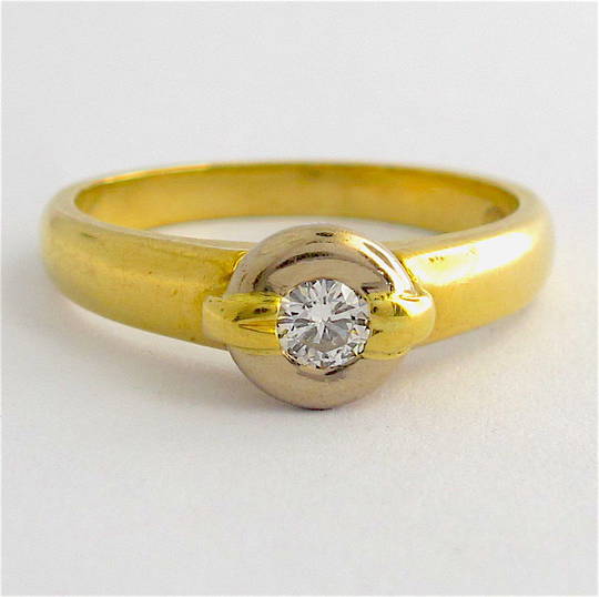 18ct yellow and white gold rub over set diamond ring