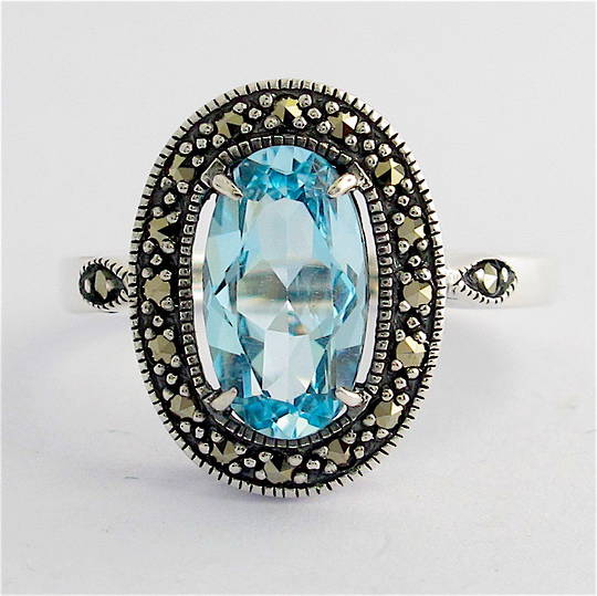 Sterling silver blue topaz and marcasite dress ring