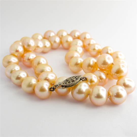 Coral/pink freshwater pearl necklace with sterling silver clasp