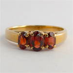 9ct yellow gold 3 stone garnet ring