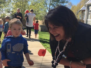 Minister of Education Hon. Hekia Parata with children