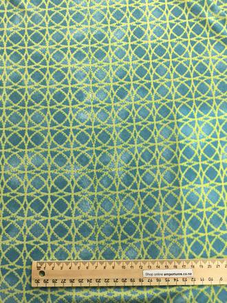Stretch fabric - Green geometric pattern