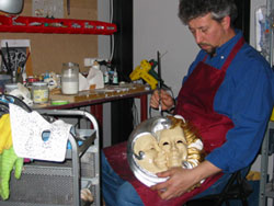 One of our mask makers at work