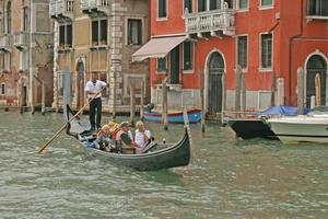 Tourists on gondola in Venice