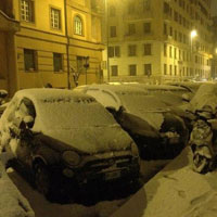 Bambina covered in snow in Rome
