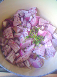 Chop up the red onions, add olive oil, fresh thyme
