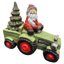 santa on green tractor