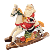 ceramic santa on rocking horse