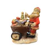 ceramic santa pushing wagon