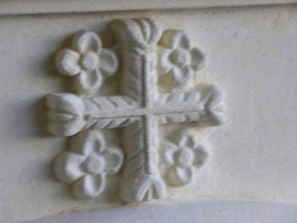 'Christian Cross' with floweret detail, carved in Oamaru Limestone
