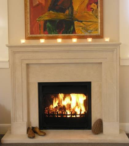 18th Century English designed Fireplace carved in Oamaru Limestone with aged Patina
