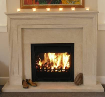 18th Century French style fireplace carved in Oamaru Limestone with aged patina