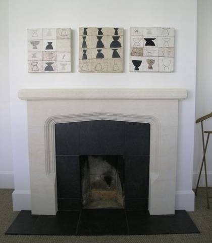 Arts and Crafts fireplace with Bluestone reveals and hearth