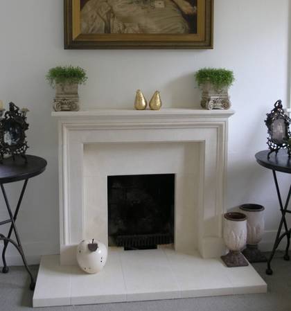 Boutique French fireplace and hearth carved in Oamaru Limestone