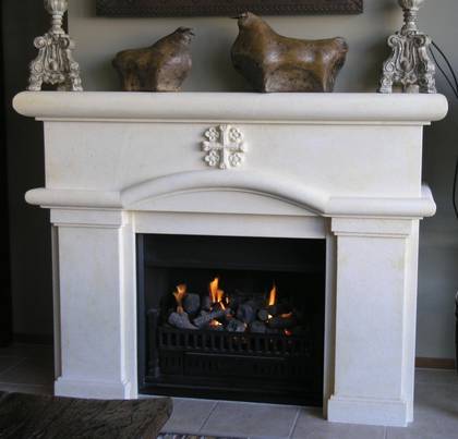 Classical Spanish Colonial designed fireplace with 'Christian Cross' floweret detail, carved in Oamaru Limestone