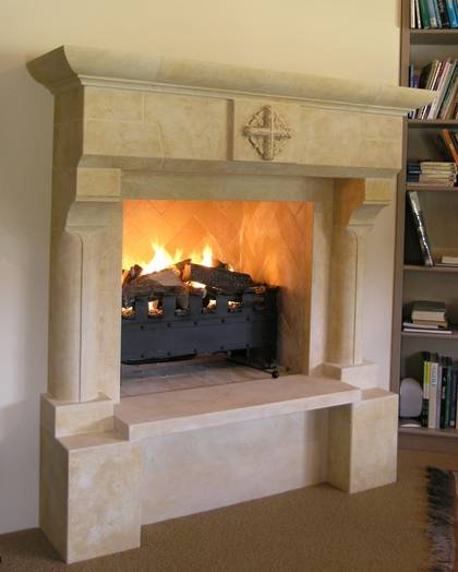 French 'Gothique' fireplace mantle with carved detail, carved in Oamaru Limestone with aged patina
