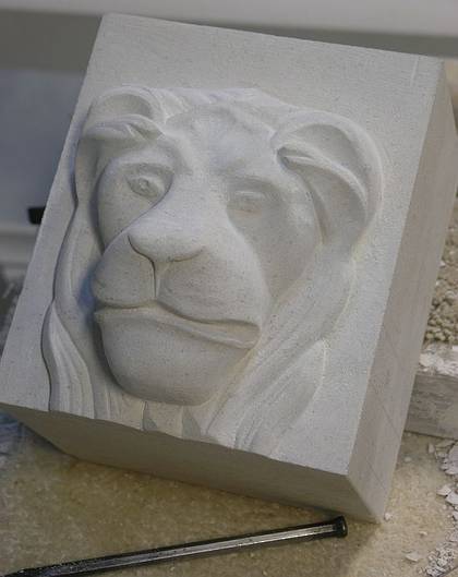 Lions head detail carved in Portuguese Limestone