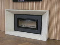 Contemporary Deep bevel mantle and hearth carved in Hinuera Stone.