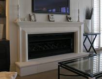 Classical Bolection style with raised hearth carved in Oamaru Limestone