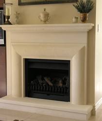 Bolection fireplace surround plain frieze and  moulded mantle, carved in Oamaru Limestone