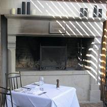 Large French 'Gothique' fireplace, carved in Hinuera stone. Commissioned by 'The Mudbrick' restaurant Waiheke Island