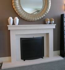 Linear styled fire surround, hearth and reveals carved in Portuguese Limestone