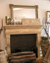 17th Century French fireplace design carved in Oamaru Limestone with aged patina