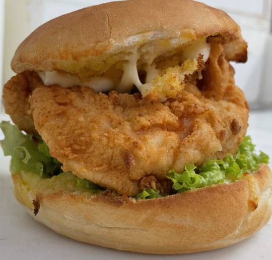 CHICKEN BURGER - coated breast tenders, melted cheese, mayo & lettuce
