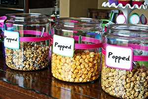 Popped pocorn in display jars with nice labels
