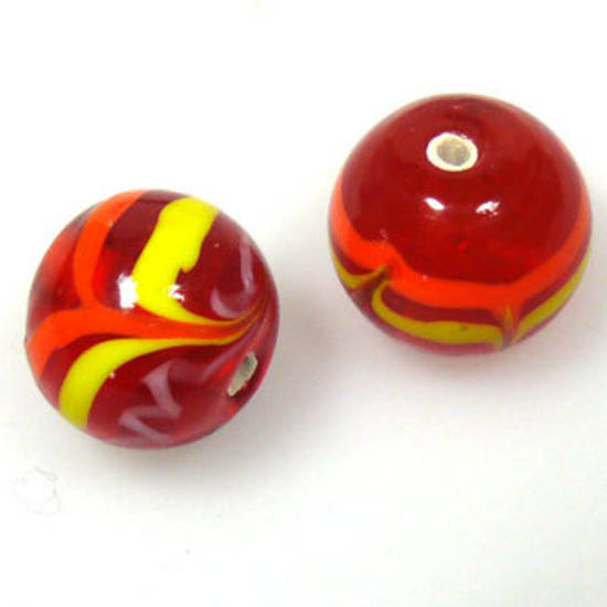 Indian Lampwork, round, red with yellow and orange design plus a little pink