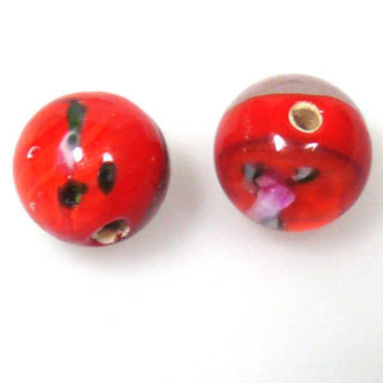 Indian Lampwork, round, orangy red core, transparent sides, floral design inside